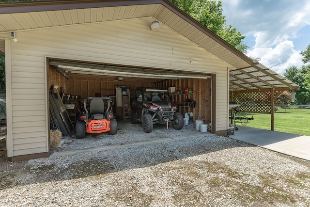 garage with a lawn