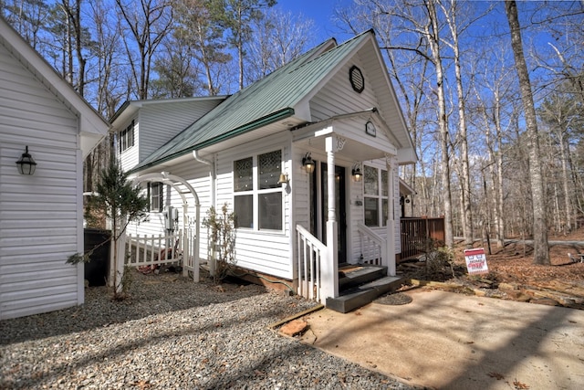 view of front of property with metal roof