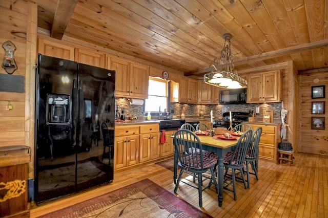 kitchen with wooden ceiling, hanging light fixtures, light wood-type flooring, backsplash, and black appliances