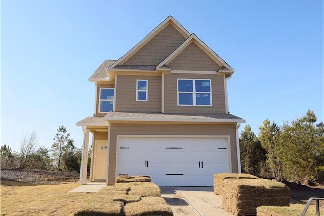 view of front of house featuring a garage and driveway