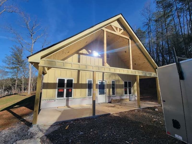 rear view of house featuring a patio