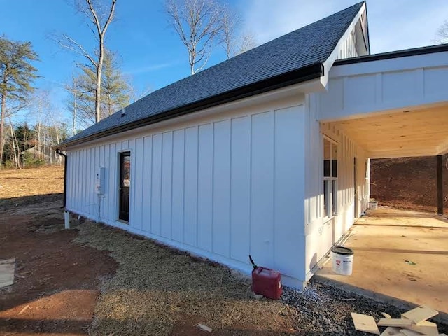 view of side of property with a patio area