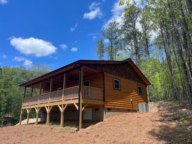 60 Lazy Creek Ln, Murphy, NC 28906 - view of front of home with crawl space, a deck, and a view of trees