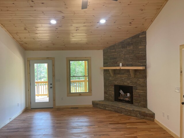 60 Lazy Creek Ln, Murphy, NC 28906 - unfurnished living room with wood finished floors, wooden ceiling, lofted ceiling, a fireplace, and a ceiling fan