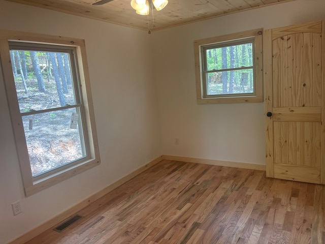 60 Lazy Creek Ln, Murphy, NC 28906 - unfurnished room with plenty of natural light, light wood-type flooring, wood ceiling, and a ceiling fan