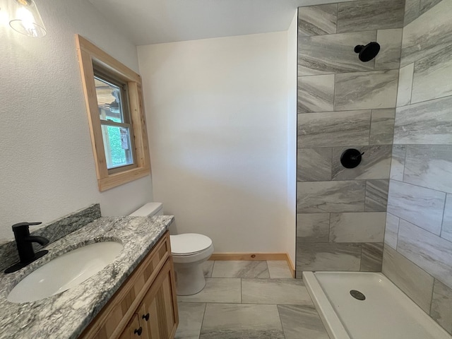 60 Lazy Creek Ln, Murphy, NC 28906 - bathroom featuring marble finish floors, vanity, and a tile shower