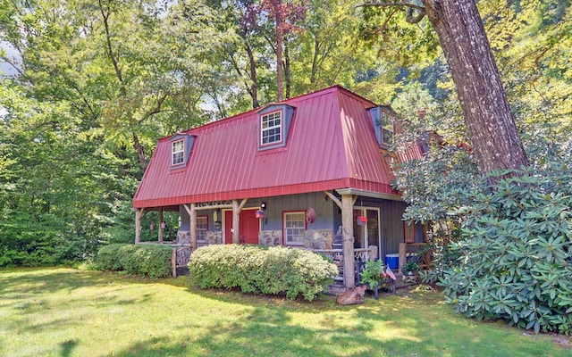 view of front of house featuring a porch and a front yard