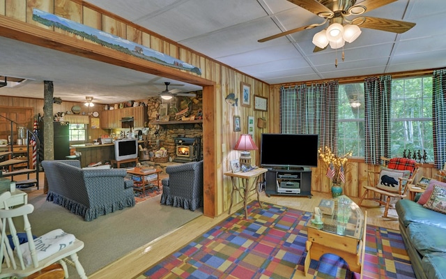 605 W Wildcat, Clarkesville, GA 30523 - living area with a ceiling fan, wood walls, and wood finished floors