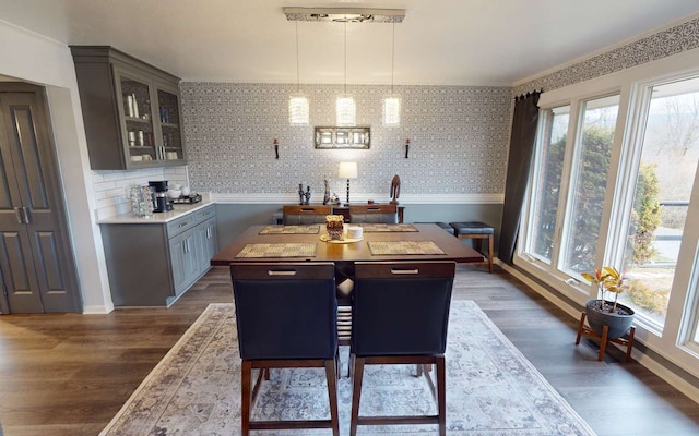 dining space featuring dark hardwood / wood-style floors