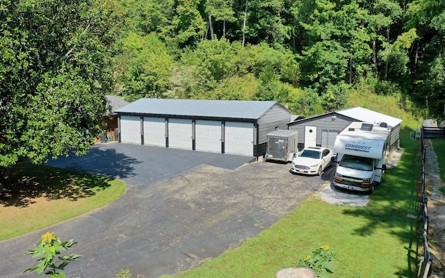 garage with a yard