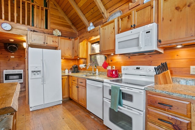kitchen with white appliances, a sink, wood ceiling, heating unit, and light wood-style floors