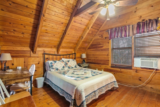 bedroom with wood ceiling, hardwood / wood-style flooring, wood walls, a ceiling fan, and cooling unit