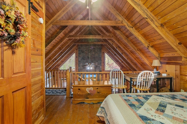 bedroom with wooden ceiling, hardwood / wood-style floors, and wooden walls