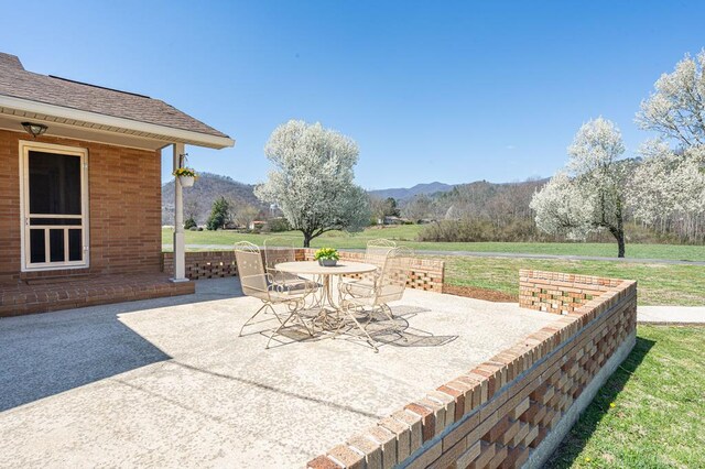 2915 Airport Rd, Marble, NC 28905 - view of patio / terrace featuring a mountain view and outdoor dining space