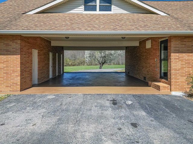 2915 Airport Rd, Marble, NC 28905 - garage featuring an attached carport and driveway