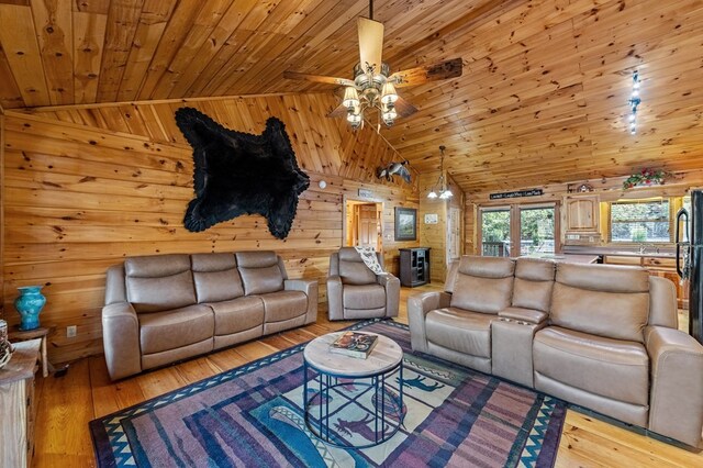 30 The Forest Rd, Blue Ridge, GA 30513 - living room with wooden ceiling, hardwood / wood-style floors, a ceiling fan, wood walls, and high vaulted ceiling
