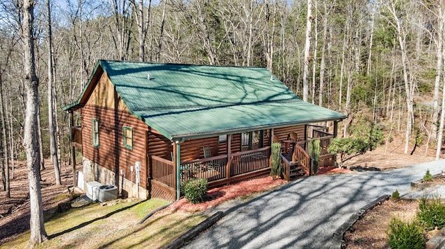 30 The Forest Rd, Blue Ridge, GA 30513 - chalet / cabin with a porch, metal roof, a wooded view, and log veneer siding