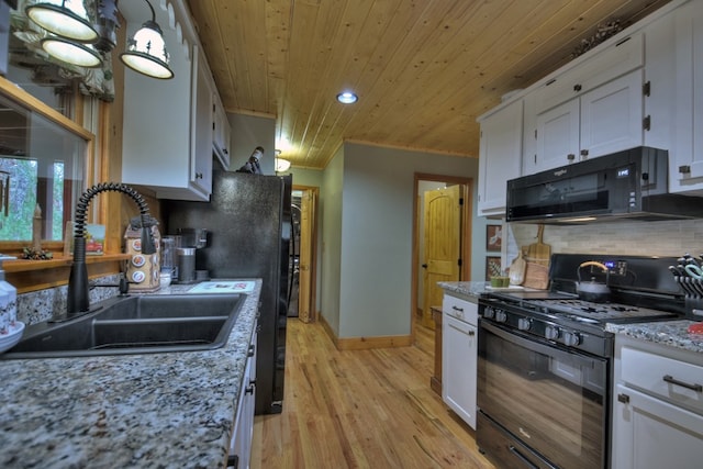 kitchen featuring sink, black appliances, decorative backsplash, white cabinets, and wood ceiling