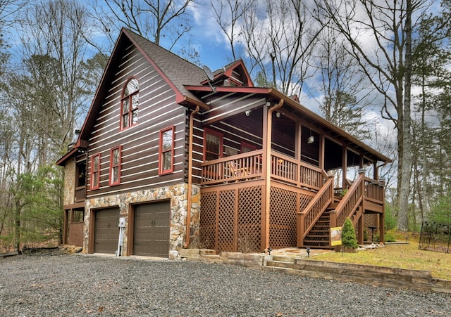 view of side of home with a garage