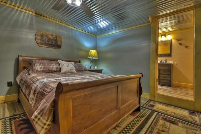 bedroom featuring ceiling fan and dark hardwood / wood-style floors