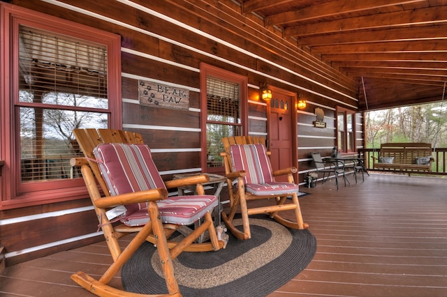 wooden deck with covered porch