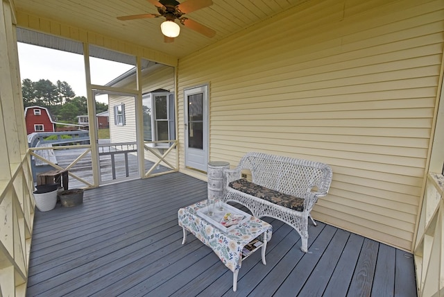 wooden terrace with ceiling fan