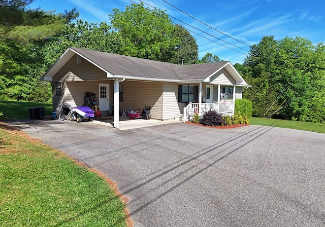 view of front of house with a porch and a front yard