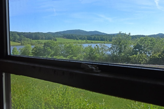 property view of mountains featuring a water view