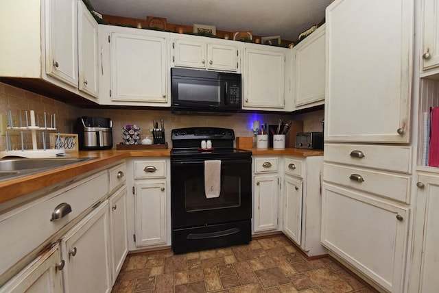 kitchen with white cabinets, decorative backsplash, a textured ceiling, and black appliances