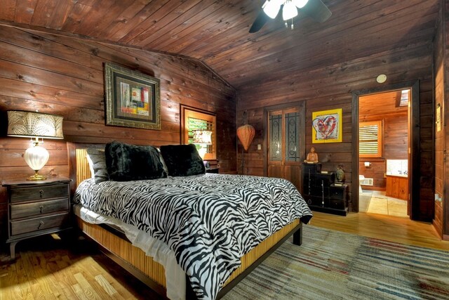 112 Songbird, Blue Ridge, GA 30513 - bedroom with lofted ceiling, wooden walls, wood finished floors, multiple windows, and wood ceiling