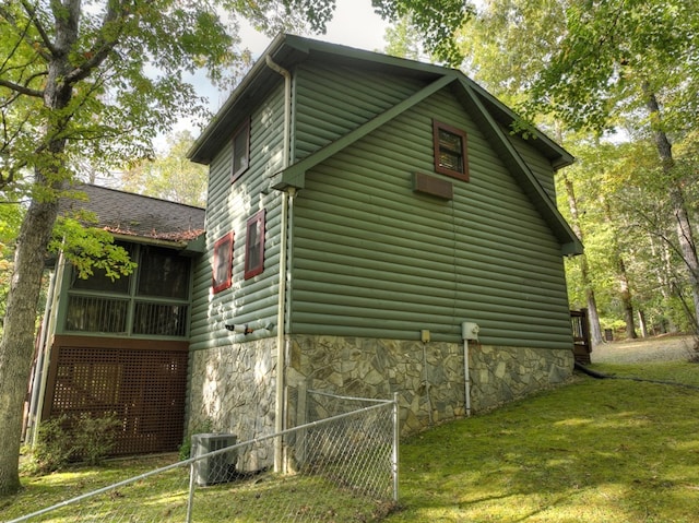 112 Songbird, Blue Ridge, GA 30513 - view of home's exterior featuring central air condition unit, stone siding, and a sunroom