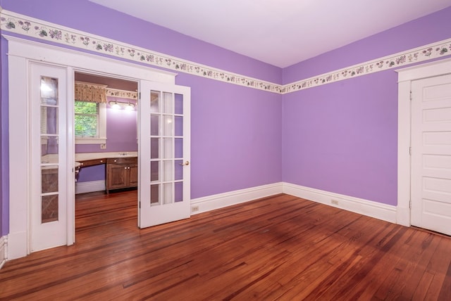 10 New Town St, Tate, GA 30177 - spare room featuring hardwood / wood-style flooring, french doors, and baseboards