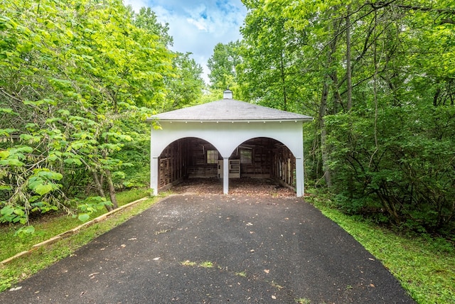 10 New Town St, Tate, GA 30177 - garage featuring driveway and a carport