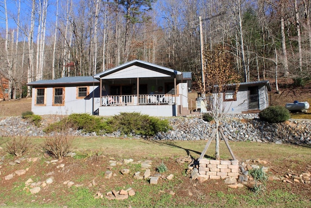 view of front of property featuring covered porch