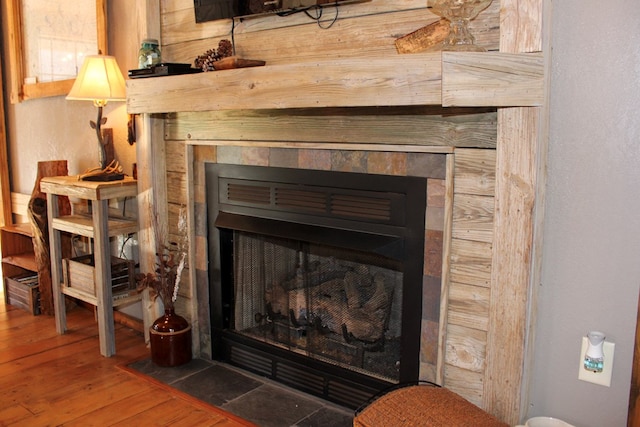 interior details featuring hardwood / wood-style flooring