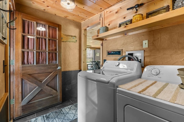 3660 Downings Creek Rd, Hayesville, NC 28904 - washroom featuring separate washer and dryer, tile walls, tile patterned floors, wooden ceiling, and wainscoting