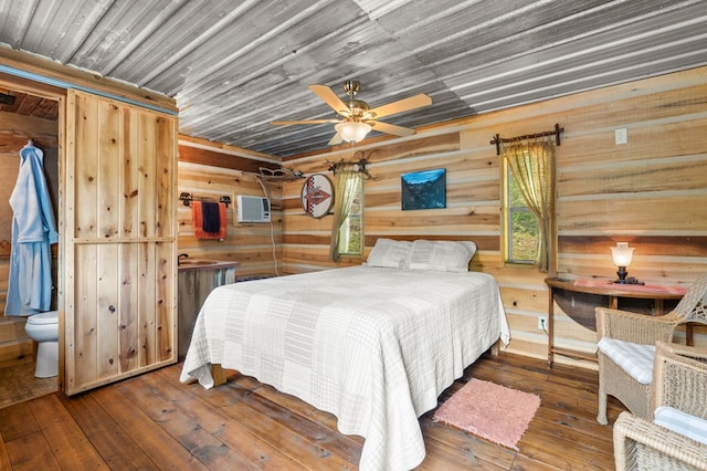 3660 Downings Creek Rd, Hayesville, NC 28904 - bedroom featuring wood-type flooring and wooden walls