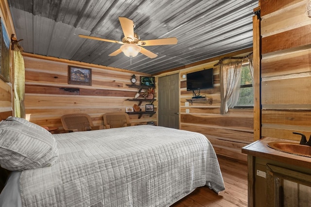 3660 Downings Creek Rd, Hayesville, NC 28904 - bedroom featuring wood walls, hardwood / wood-style flooring, ceiling fan, and wood ceiling