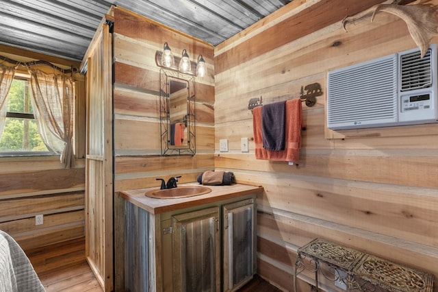 3660 Downings Creek Rd, Hayesville, NC 28904 - bathroom with wooden walls, vanity, wood finished floors, a wall mounted air conditioner, and wood ceiling