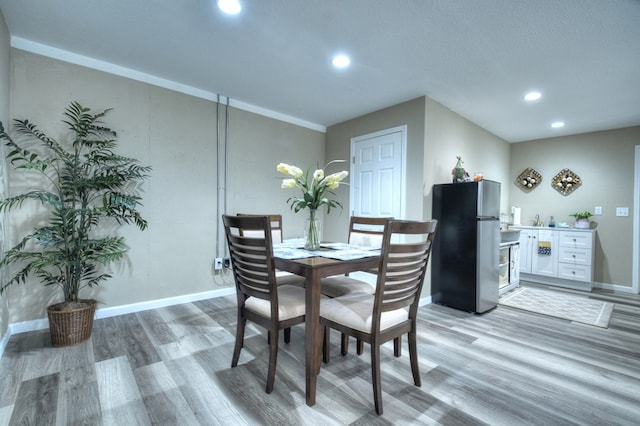 dining area featuring light hardwood / wood-style floors