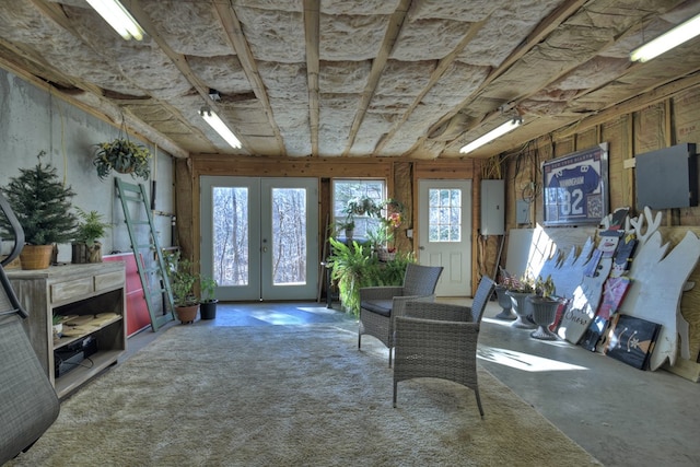 interior space featuring electric panel and french doors