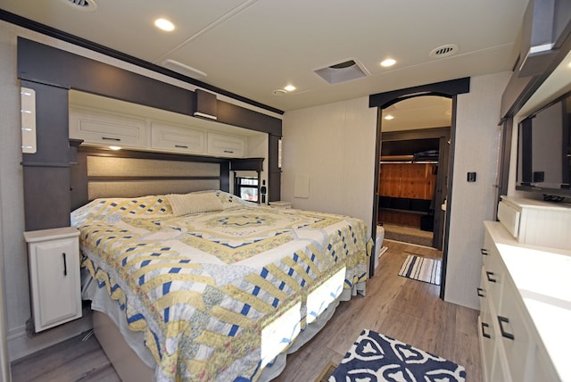 bedroom featuring light hardwood / wood-style floors