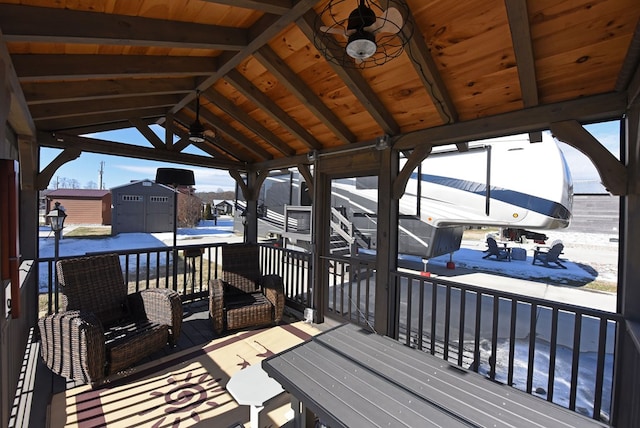 wooden deck with a gazebo