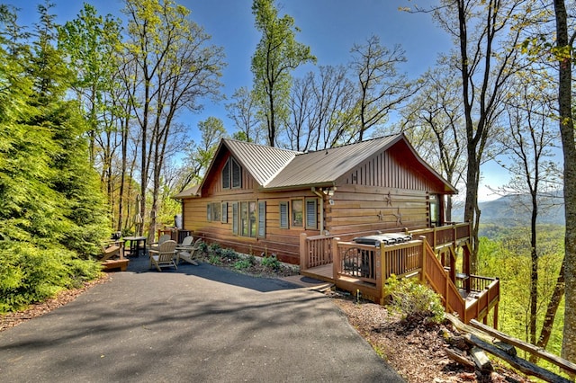 783 Moreland Dr N, Cherry Log, GA 30522 - log-style house featuring a wooden deck