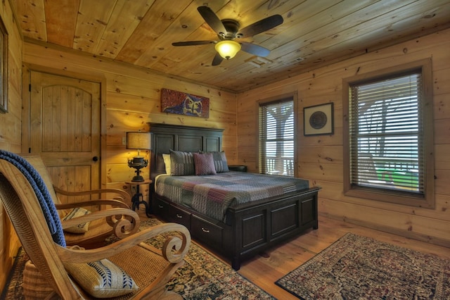 783 Moreland Dr N, Cherry Log, GA 30522 - bedroom featuring wood ceiling, wood walls, ceiling fan, and hardwood / wood-style floors