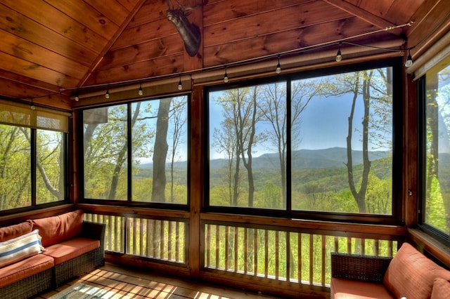 783 Moreland Dr N, Cherry Log, GA 30522 - unfurnished sunroom featuring vaulted ceiling, a healthy amount of sunlight, and wood ceiling