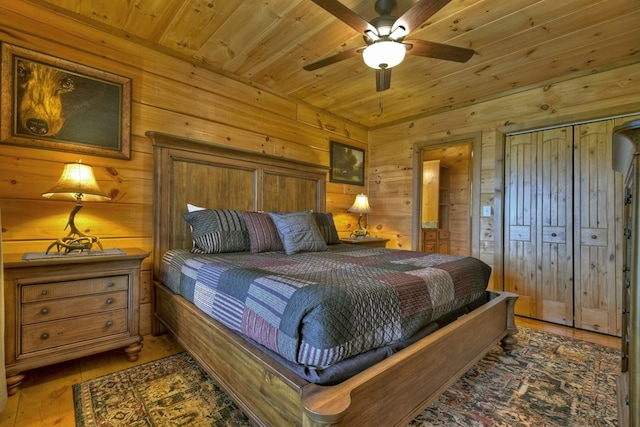 783 Moreland Dr N, Cherry Log, GA 30522 - bedroom featuring wooden ceiling, ceiling fan, hardwood / wood-style flooring, and wooden walls