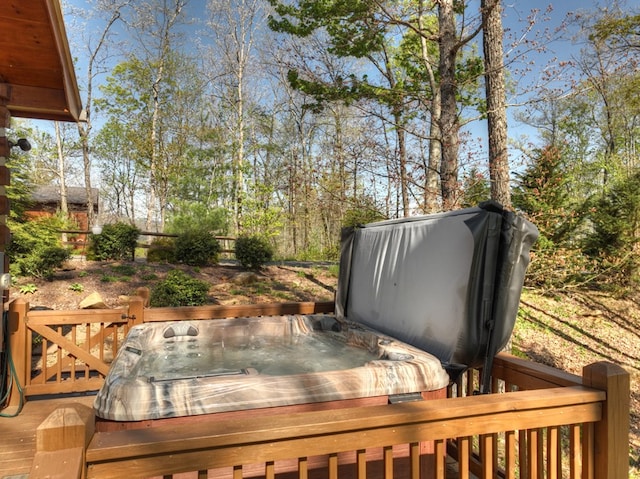 783 Moreland Dr N, Cherry Log, GA 30522 - deck with a covered hot tub
