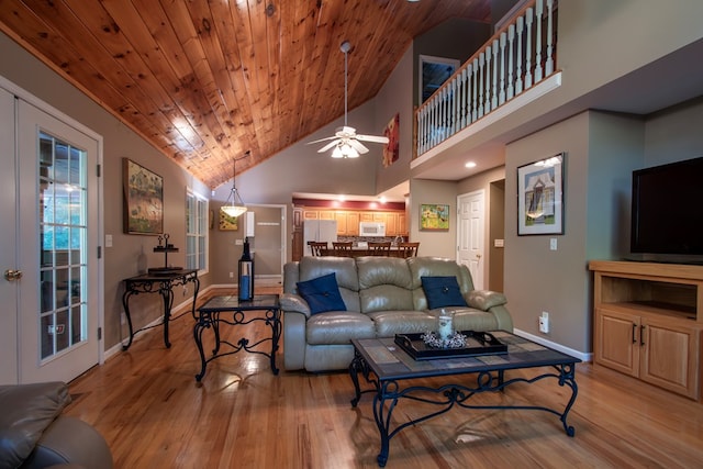 living room with french doors, ceiling fan, light wood-type flooring, high vaulted ceiling, and wooden ceiling