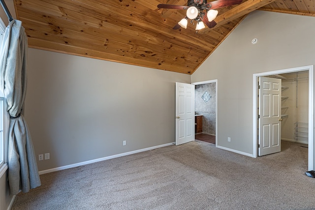 425 Tarheel Dr W, Murphy, NC 28906 - unfurnished bedroom featuring high vaulted ceiling, carpet floors, wooden ceiling, a walk in closet, and baseboards